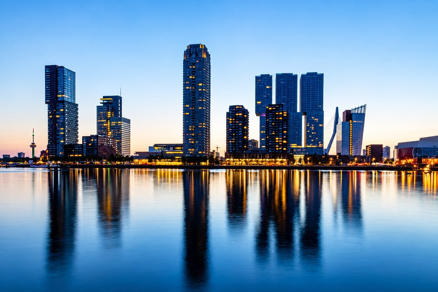 Kop van Zuid skyline reflected in the River Maas at blue hour, Rotterdam