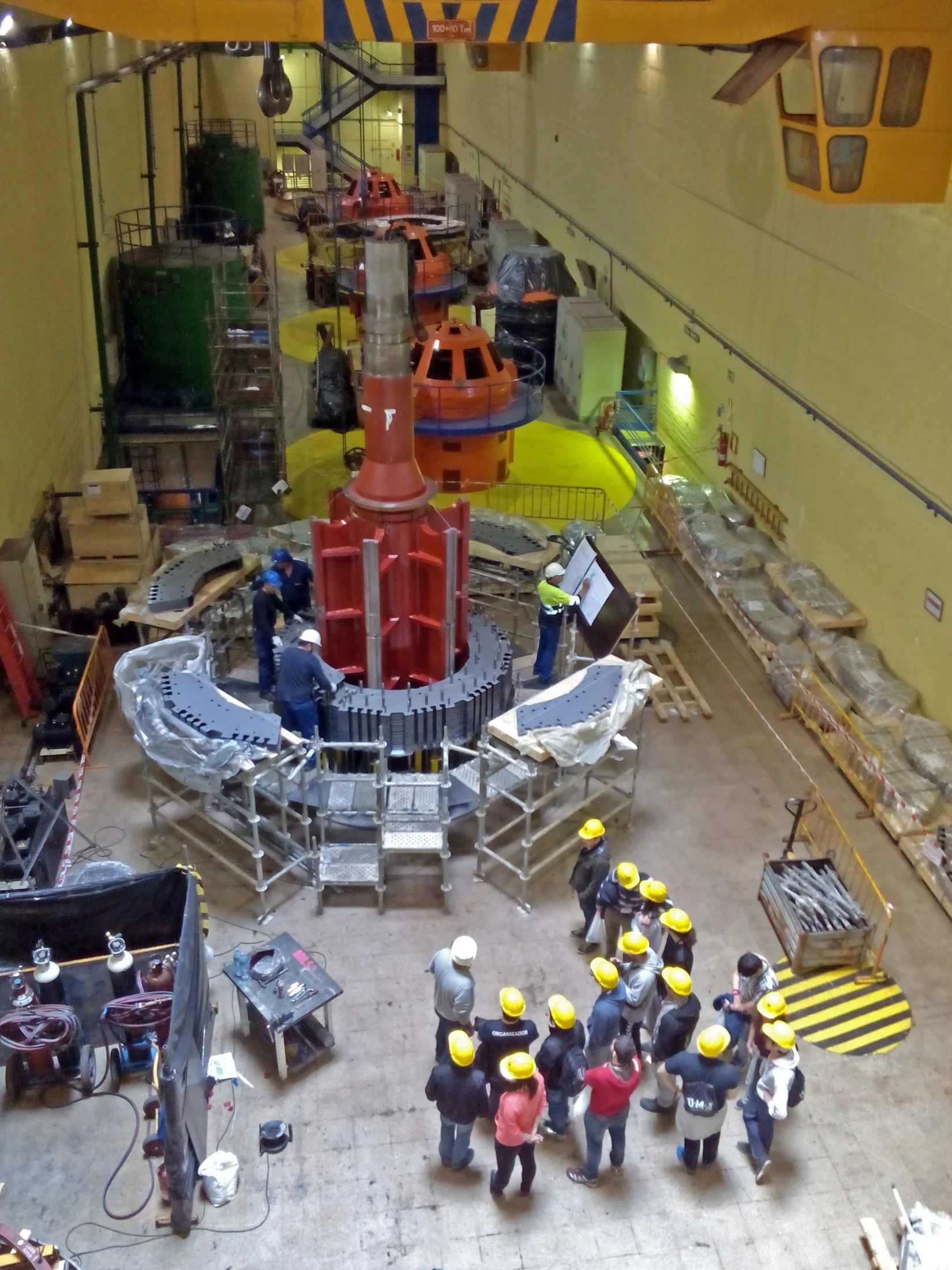 Engineers repairing the rotor of a hydroelectric power-plant generator, 10 April 2015. Location is not specified by source.